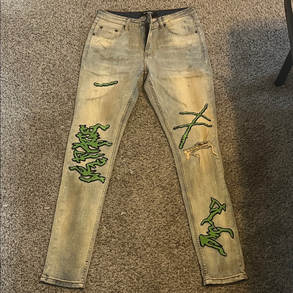 Stylish Tan Jeans with Green Accents